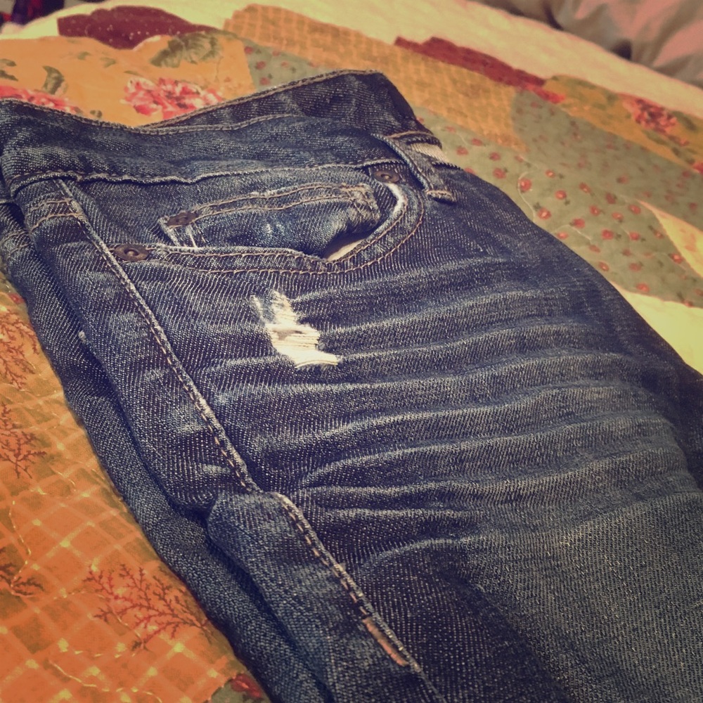 Calvin Klein distressed dark jeans